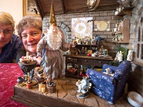 Members of the Miniature Enthusiasts of Kingston and Area Adrian Cooper Club President (left), and Elizabeth Read, Secretary Web Mistress with a miniature display constructed by Read for Saturdays Dollhouse and Miniatures Show and Sale at Portsmouth Olympic Harbour, at Read’s home in Kingston, on May 4, 2016. Nick Tardif/The Kingston Whig-Standard/Postmedia Network