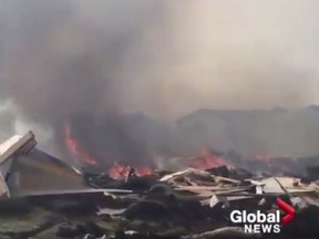 A screen capture of some incredible footage shot inside Fort McMurray. The video  was obtained by Global News.