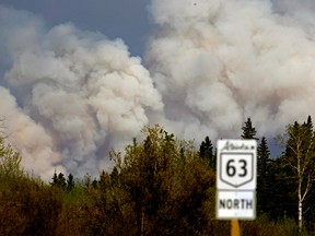 Over 1,110 firefighters are tackling a total of 49 wildfires in Alberta. Seven of which are considered out of control, including the 85,000 hectare fire burning in Ft. McMurray. A province-wide fire ban has been issued effective immediately to ensure that the already strained resources are not pulled from where they need to be. | Larry Wong photo/POSTMEDIA Network