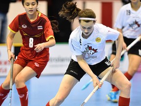 Team Canada defenceman, Alexa Hoskin, of Belleville, controls the ball during IFF U19 women's world floorball championship action Thursday night at Yardmen Arena. (Aaron Bell photo)