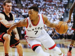 Toronto Raptors guard Kyle Lowry in first half action of Game 2 against the Miami Heat's Goran Dragic at the Air Canada Centre in Toronto on May 5, 2016. (Stan Behal/Toronto Sun/Postmedia Network)