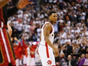 Kyle Lowry after scoring a basket as the Toronto Raptors tie the series in Game 2 against the Miami Heat at the Air Canada Centre in Toronto on May 5, 2016. (Stan Behal/Toronto Sun/Postmedia Network)