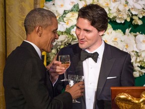 Prime Minister Justin Trudeau proposes a toast to US President Barack Obama during a state dinner Thursday, March 10, 2016 in Washington. THE CANADIAN PRESS/Paul Chiasson