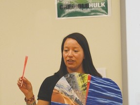 Tanya Warren shows that only 1/32th of the world’s surface is used for agricultural production at a Classroom Agriculture Program presentation at Muir Lake School on May 3. - Photo by Marcia Love