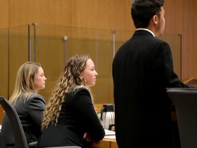 Emily Mountney-Lessard/The Intelligencer
Mikayla MacDonald and Ainsley MacDonald, of St. Paul Catholic Secondary School in Trenton, participate in a mock trial at the Quinte Consolidated Courthouse on Friday.