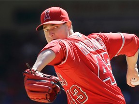 Los Angeles Angels pitcher Garrett Richards throws during the first inning against the Texas Rangers in Arlington, Texas, Sunday, Oct. 4, 2015. (AP Photo/LM Otero)