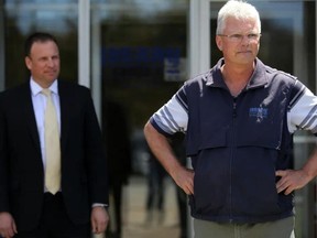 Emily Mountney-Lessard/The Intelligencer
Rick Smith, plant manager of Berry Plastics Canada in Belleville, is shown here during a funding announcement at the plant on Friday in Belleville. Shown in the background is Chris King, chief executive officer of Quinte Economic Development Corporation.