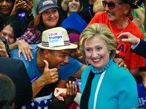 Democratic presidential candidate Hillary Clinton greets supporters as she campaigns at East Los Angeles College in Los Angeles on Thursday. (Damian Dovarganes/The Associated Press)