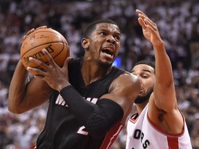 Miami Heat’s Joe Johnson drives to the basket as Toronto Raptors’ Cory Joseph defends during overtime in Toronto on Thursday, May 5, 2016. (THE CANADIAN PRESS/Frank Gunn)