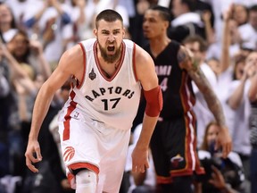 Toronto Raptors centre Jonas Valanciunas reacts after scoring from a rebound during second-half NBA playoff action against the Miami Heat in Toronto on May 5, 2016. (THE CANADIAN PRESS/Frank Gunn)
