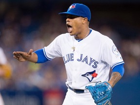 Toronto Blue Jays starting pitcher Marcus Stroman celebrates a double play on the Los Angeles Dodgers during sixth-inning interleague action at the Rogers Centre in Toronto on May 6, 2016. (THE CANADIAN PRESS/Frank Gunn)