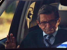 In this Nov. 9, 2011 file photo, Penn State football coach Joe Paterno arrives home in State College, Pa. (AP Photo/Matt Rourke)