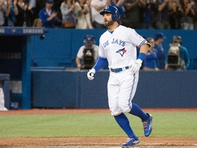 Kevin Pillar of the Toronto Blue Jays crosses home plate after hitting a three-run home run during the eighth inning in a game against the Los Angeles Dodgers at Rogers Centre on May 6, 2016. The Blue Jays won 5-2. (NICK TURCHIARO/USA TODAY Sports)