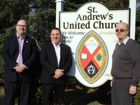 Ward 7 Coun. Mike Jakubo (left), Nickel Belt MPP Marc Serre and Les Lisk pose Friday outside St. Andrew's United Church in Coniston, where Serre announced federal funding for accessibility improvements. Ben Leeson/The Sudbury Star/Postmedia Network