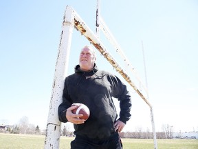 Gino Donato/Sudbury Star
Local high school teacher Mike Derks, a former Canadian Football League offensive lineman and Grey Cup champion, poses for a photo at Lasalle Secondary School, where he teaches. Derks has been battling concussion symptoms.