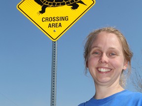 Sarah Woods, of the Junction Creek Stewardship Committee, unveiled a turtle crossing road sign on Southview Drive between Robinson and Kelly Lakes in Sudbury, Ont. on Friday May 6, 2016. The stewardship committee examined turtle populations in the Junction Creek watershed over the past several years, with the financial assistance of the Ministry of Natural Resources and Forestry. The group identified the Southview Drive area crossing in particular, as a location where turtles are often struck and killed by vehicles. This project was made possible through a donation from the local dance troop earthdancers. John Lappa/Sudbury Star/Postmedia Network