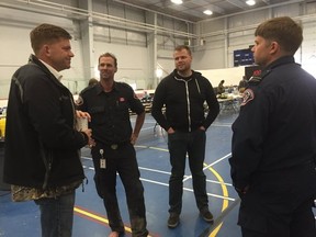 Brian Jean speaks with first responders battling to keep the wildfire at bay. (Brian Jean/Twitter)