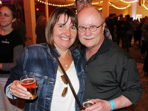 Heather Freer from Corunna and Larry Murphy from Sarnia show their samples at the Beer Show on Friday, May 6, 2016 in Sarnia, Ont. The two-day event ran at the Bayside Centre. Terry Bridge/Sarnia Observer/Postmedia Network