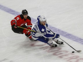 Marlies' William Nylander is hounded by Joseph Blandisi of the Albany Devils during Game 2 of their playoff series on Friday at the Ricoh Coliseum. (DAVE THOMAS, Toronto Sun)