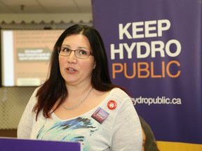 Kerri Chevrier addresses a crowd at the Keep Hydro Public campaign launch in Sudbury, Ont. on Saturday May 7, 2016. John Lappa/Sudbury Star/Postmedia Network