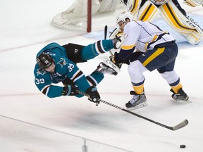 San Jose Sharks centre Logan Couture (39) is tripped by Nashville Predators defenceman Shea Weber (6) during Game 5 of the second round playoff series Saturday at SAP Center at San Jose. (Kyle Terada/USA TODAY Sports)