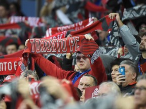 May 7, 2016; Toronto, Ontario, CAN; Toronto FC fans hold up scarves as they sing anthems prior to kickoff against FC Dallas at BMO Field. Toronto won 1-0. Mandatory Credit: Dan Hamilton-USA TODAY Sports