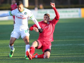 New York Cosmos forward Jairo Arrieta (left) battles Fury FC midfielder Marcel de Jong earlier this year. (USA Today Sports)