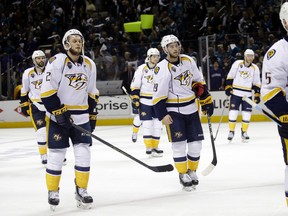 Members of the Nashville Predators skate off the ice after a 5-1 loss to the San Jose Sharks during Game 5 in an NHL hockey Stanley Cup Western Conference semifinal series Saturday, May 7, 2016, in San Jose, Calif. (AP Photo/Marcio Jose Sanchez)
