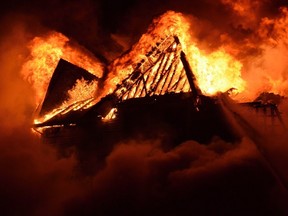 Fire engulfs a seniors residence in L'Isle-Verte, Que., early Thursday, Jan.23, 2014. THE CANADIAN PRESS/Frances Drouin