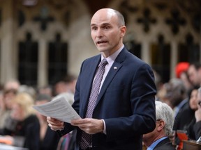 Minister of Families, Children and Social Development Jean-Yves Duclos answers a question during Question Period in the House of Commons on Parliament Hill in Ottawa, on Thursday, Feb.25, 2016. THE CANADIAN PRESS/Adrian Wyld