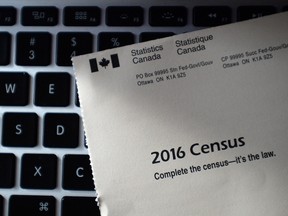 A Statistics Canada 2016 Census sits on the key board of a laptop after arriving in the mail at a home in Ottawa on Monday, May 2, 2016. THE CANADIAN PRESS/Sean Kilpatrick