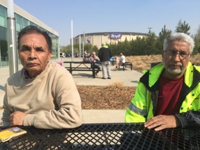 Muhammad Saleem Akhtar, left, and Haji Choudhry were evacuated from Fort McMurray with little but their passports and the clothes on their backs.