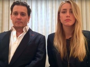 Amber Heard and Johnny Depp issued a video apology for providing false documents when bringing their dogs Pistol and Boo into Australia. (WENN.COM)