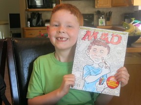 Seven-year-old TJ Desjarlais poses in Medicine Hat, Alta., on May 6, 2016. Desjarlais is basking in the limelight after being featured in Mad Magazine as a dead ringer for the publication's iconic face Alfred E. Neuman. (THE CANADIAN PRESS/Bill Graveland)