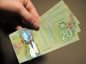 Canadian $20 bills currency money GETTY