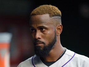 Rockies shortstop Jose Reyes could face a suspension of at least 60 games for his offseason domestic violence arrest. (Nick Wass/AP Photo/Files)