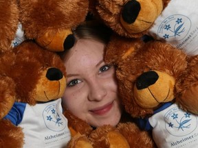 Luke Hendry/The INtelligencer
Amelia Huffman, the fund development co-ordinator for the Alzheimer Society of Hastings-Prince Edward, is surrounded by furry assistants in Belleville. The bears are among the prizes for participants in this month's Walk for Alzheimer's in Belleville and Wellington.