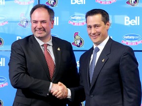 The new head coach of the Ottawa Senators, Guy Boucher, was introduced to the media by GM Pierre Dorion at Canadian Tire Centre on May 9, 2016. (JULIE OLIVER/POSTMEDIA)