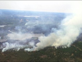 Kenora Fire 18, which crossed the Ontario/Manitoba border in the Ingolf area, was last estimated at 1,000 hectares in size and not under control. An Incident Management Team has been assigned to the fire which has had continuous air attack with CL-415 heavy water bombers and Ontario fire rangers dedicated to placing values protection sprinklers on cottages at lakes in the area threatened by the fire. 
SUPPLIED/Ministry of Natural Resources and Forestry