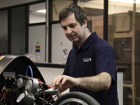 Recent George Brown College graduate Ryan Billinger works on a low-fuel, high mileage racing vehicle. He joined a fourth-year University of Toronto engineering multidisciplinary capstone design team tasked to design and develop the engine for the vehicle, which achieved 3,421 miles to the gallon during the 2015 Shell Eco-Marathon Americas in Detroit.