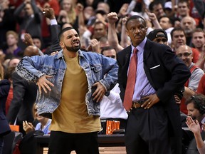 Raptors global ambassador Drake reacts to a Toronto Raptors basket as head coach Dwane Casey watches play against Indiana Pacers in game seven of the first round of the 2016 NBA Playoffs at Air Canada Centre May 1, 2016. The Raptors advanced with a 89-84 win. (Dan Hamilton-USA TODAY Sports)