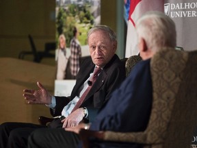 Former Prime Minister Jean Chretien, left, speaks with former MP Bob Rae during an event launching the MacEachen Institute for Public Policy and Governance at Dalhousie University in Halifax on Monday, May 9, 2016. THE CANADIAN PRESS/Darren Calabrese