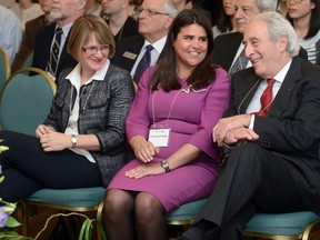 Audra Bowlus, chair of the economics department at Western University, left, chats with Eve Beauchamp, manager of the Jarislowsky Foundation, and foundation director Frederic Lowy during a ceremony to announce a $2 million donation to establish the Jarislowsky Chair in Central Banking at Western University on Monday. (MORRIS LAMONT, The London Free Press)