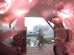 Doorbell camera captures dramatic attempt by firefighters to save a house in Fort McMurray. Supplied.