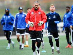 FC Edmonton, shown here practising in cool weather in April, seem to have bad luck with the weather, with temperatures regularly dropping on game days, helping to drive down fan attendance. (Dan Reidlhuber)