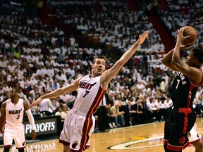Toronto Raptors guard Kyle Lowry shoots past Miami Heat guard Goran Dragic during the first quarter in Game 4 of the second round of the NBA Playoffs at American Airlines Arena in Miami on May 9, 2016. (Steve Mitchell/USA TODAY Sports)