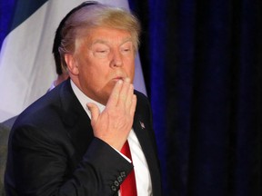 Republican presidential candidate, businessman Donald Trump blows a kiss after speaking  on Feb. 1, 2016, in West Des Moines, Iowa. (AP Photo/Jae C. Hong)