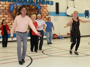 Sequence dance instructors Alec Ip and Christine Rail lead a group of dancers during a practice at Lakeroad Public School.
CARL HNATYSHYN/SARNIA THIS WEEK