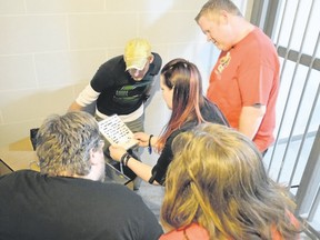 Louis Pin/Chatham This Week
From left: Eric Brenders, William Scott Shepherd, Lisa Lucier, GeorgyAnne Pigeon, and Tim Stoffyn, all from CK Expo, were the final test group for LockedIn, on May 5. The new Chatham escape room opened a day later — just in time for summer.