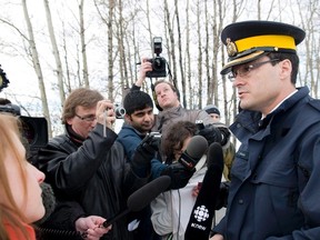 RCMP Inspector Tim Shields speaks with media at the entrance road to Wiebo Ludwig's Trickle Creek Farm in Hythe, Alta., on January 9, 2010. The high-profile RCMP officer once in charge of the Mounties' communications strategy at E Division in Vancouver has been charged with sexual assault. The Criminal Justice Branch says a charge has been sworn against Shields as a result of an investigation into sexual misconduct. THE CANADIAN PRESS/Jimmy Jeong
